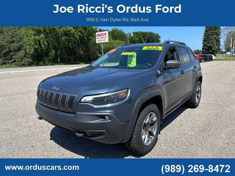 2019 Jeep Cherokee Trailhawk Elite 4x4 4dr SUV in Blue Shade Pearl — front three-quarter view