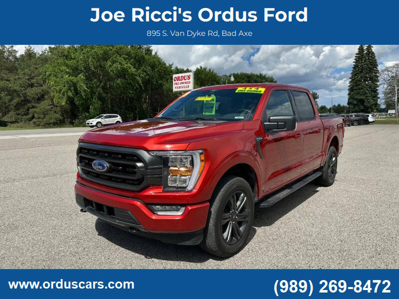 2023 Ford F-150 XLT 4x4 4dr SuperCrew 5.5 ft. SB in Hot Pepper Red — front three-quarter view