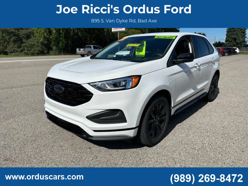 2022 Ford Edge SE AWD 4dr Crossover in White — front three-quarter view
